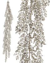 Decorative silver garland with beads on a white background