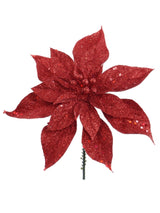 Red glittery poinsettia flower on a white background