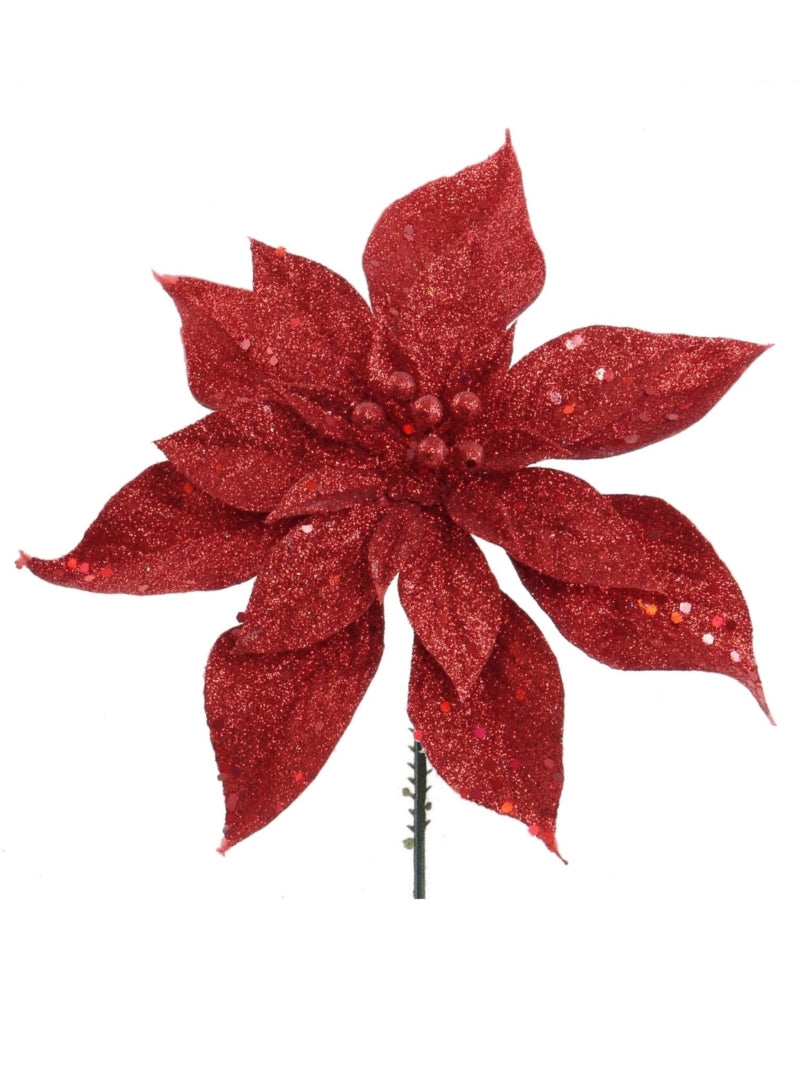 Red glittery poinsettia flower on a white background