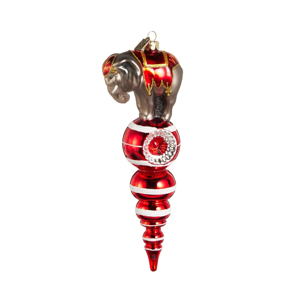 Decorative glass ornament of an elephant on a white background