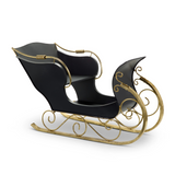 Black and gold sleigh on a white background