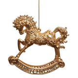 Decorative gold rocking horse ornament on a white background