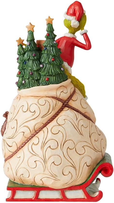 Aldea Grinch de 11.5" con Escena Rotatoria Iluminada de Grinch
