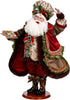 Decorative figure of aANTA in a detailed costume on a white background