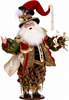 Decorative figure of a festive character with a red hat and white beard, holding a bag and a staff.