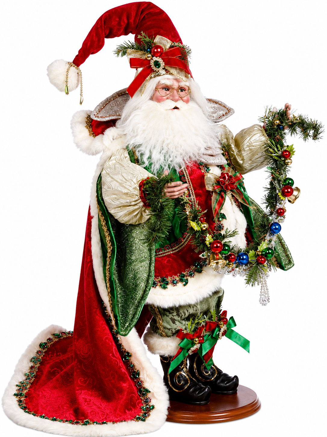 Decorative Santa with a red jeweled hat holding a wreath on a white background