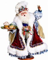 Decorative Santa carrying cupcake with tray on a white background.