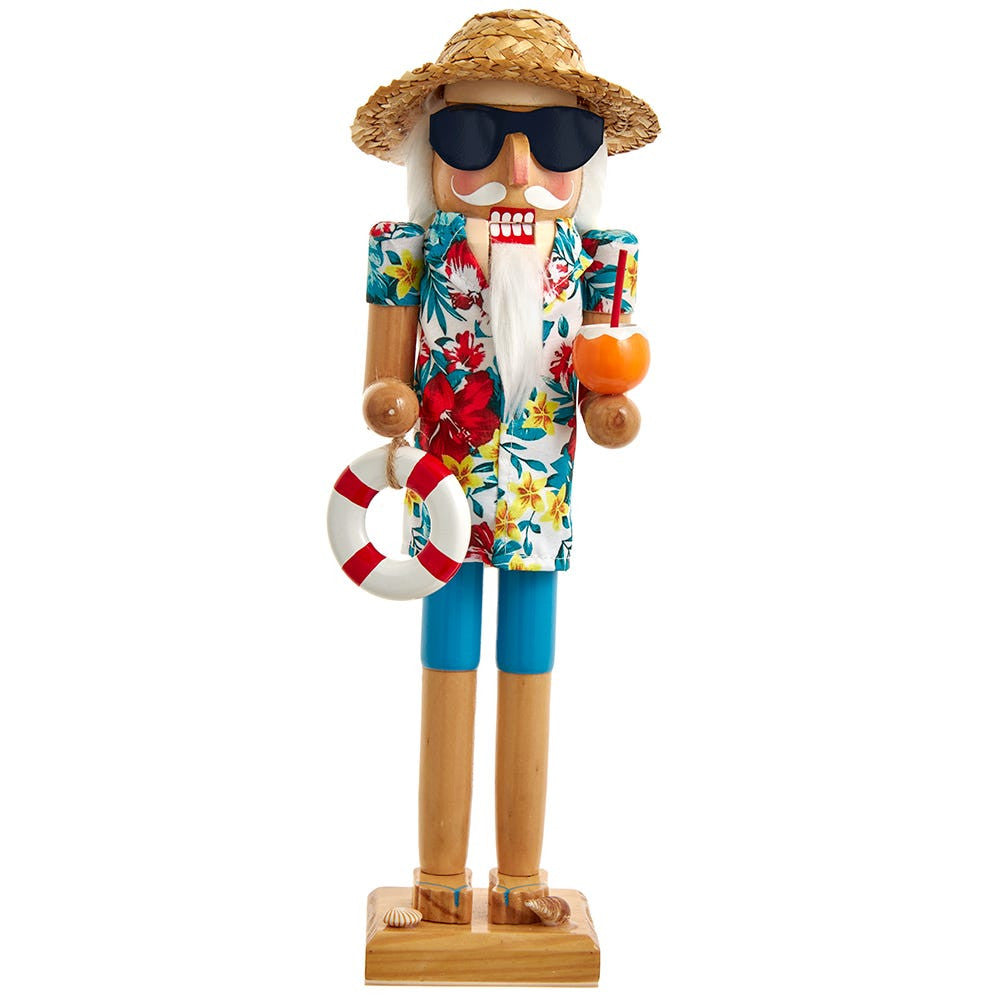 Wooden nutcracker figurine of a man in a tropical outfit with a hat, sunglasses, and life preserver.