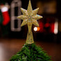 Estrella para árbol con proyector Polaris con purpurina dorada de 13,75"