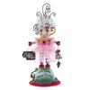 Decorative figurine of a character in a coffee-themed outfit with a 'Coffee Bar' sign.