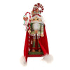 Decorative Christmas elf figurine with a candy cane hat and red cape on a white background