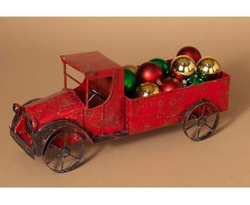 Camioneta antigua roja de 18,5" con bolas de adorno