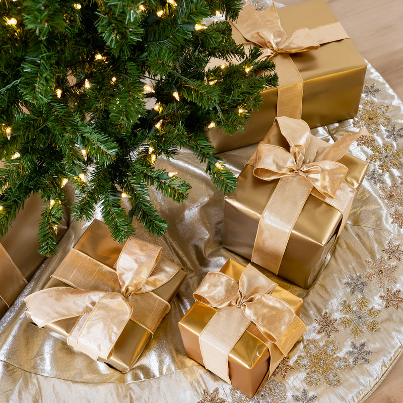 Family decorating a Christmas tree