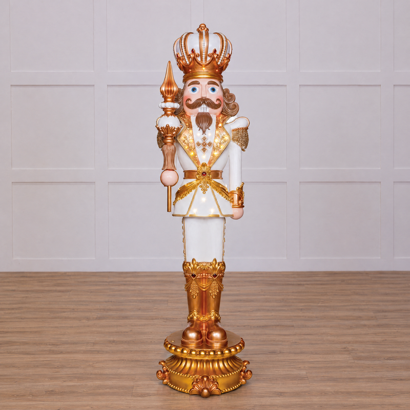 A 10 foot tall white and gold king nutcracker with LED lights and a decorative base, suitable for holiday decor.