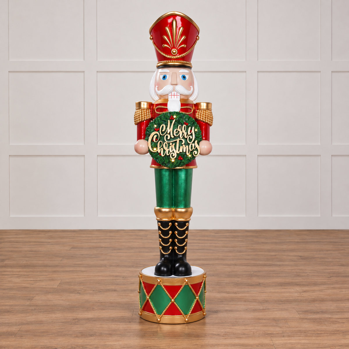 Decorative Christmas nutcracker with 'Merry Christmas' text on a white background