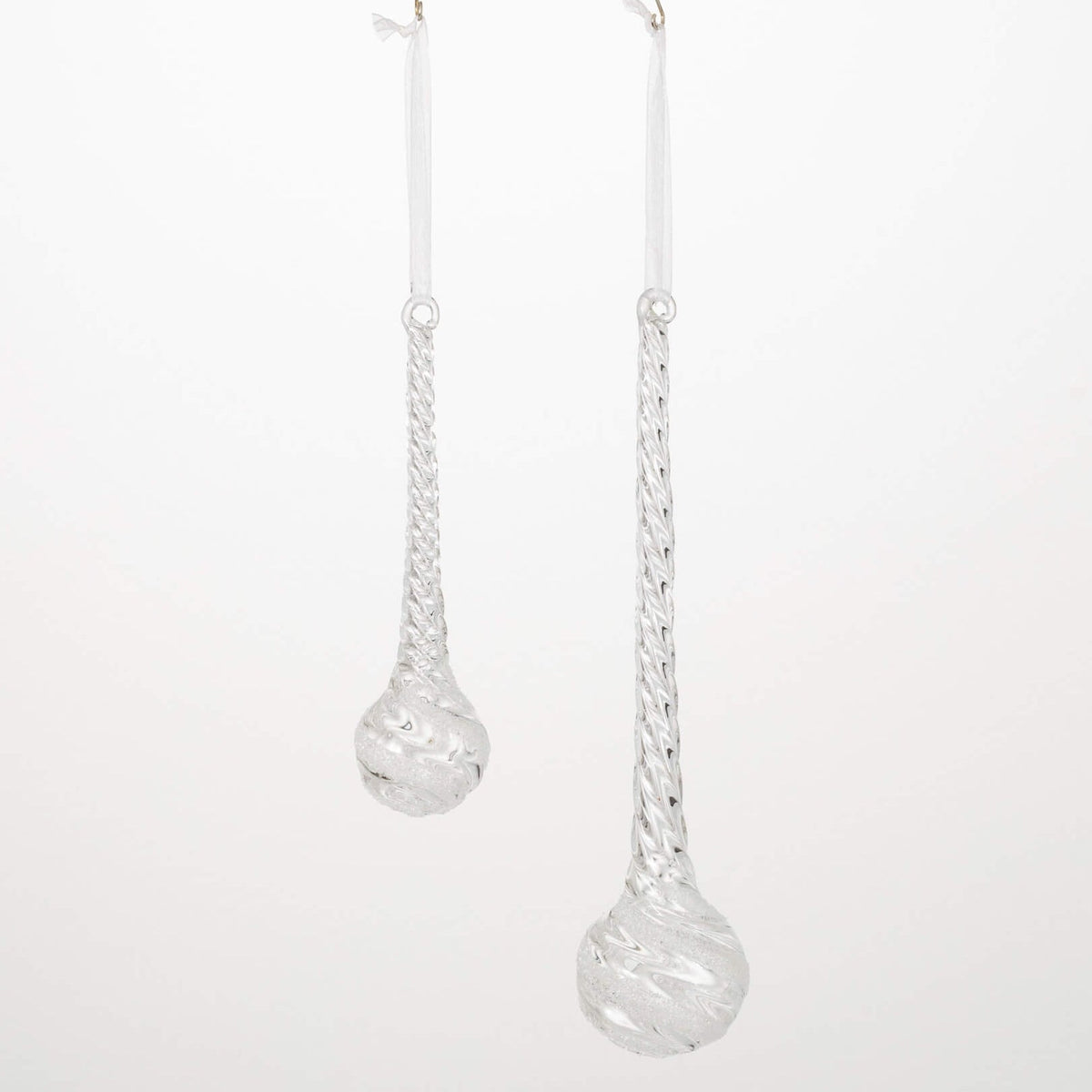 Silver teardrop earrings on a white background